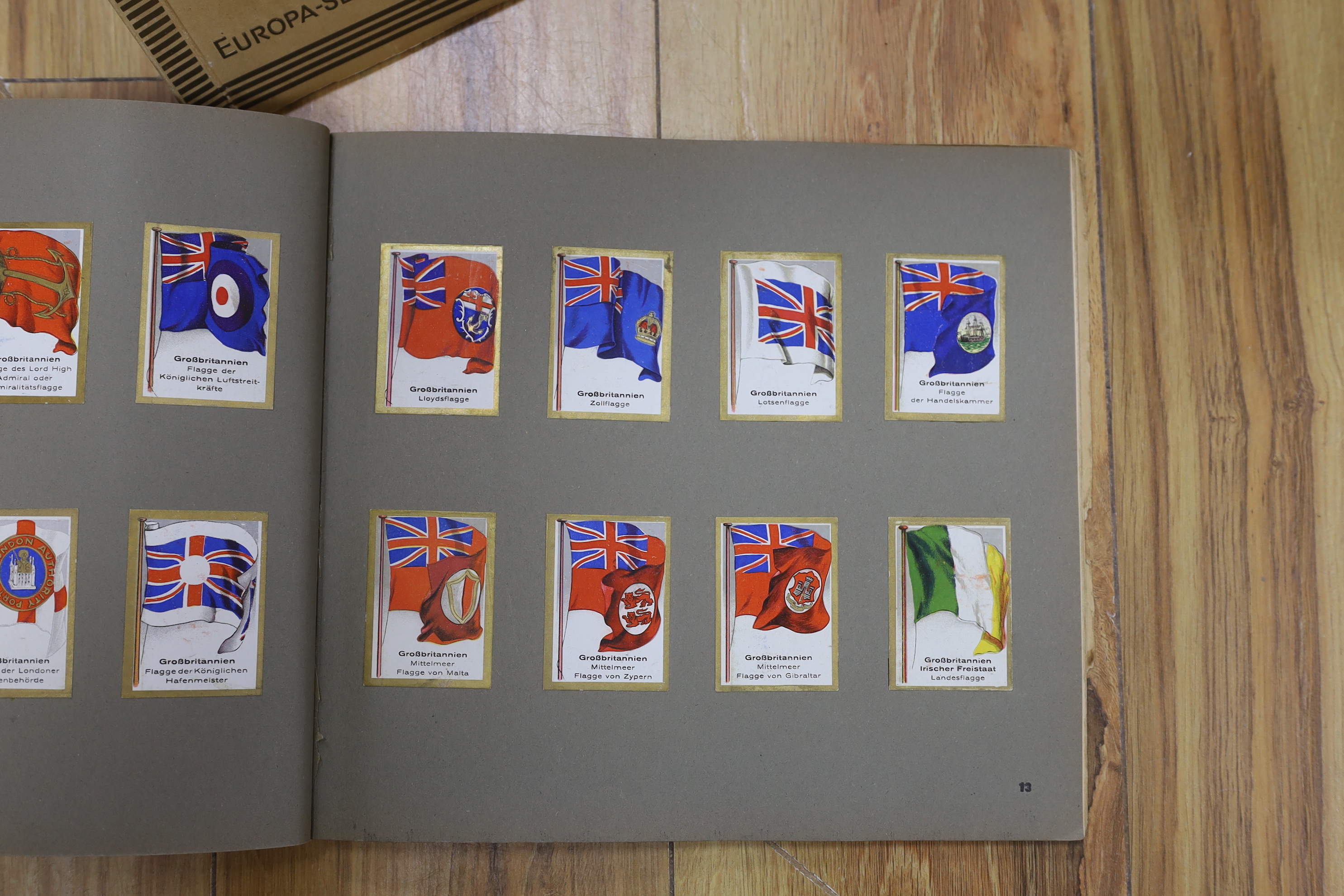 A collection of cigarette cards in albums